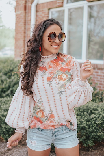 woman in floral blouse