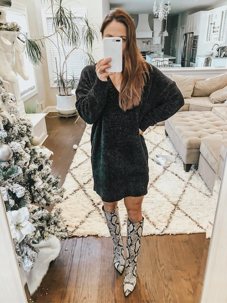 woman wearing chenille dress and snakeskin boots